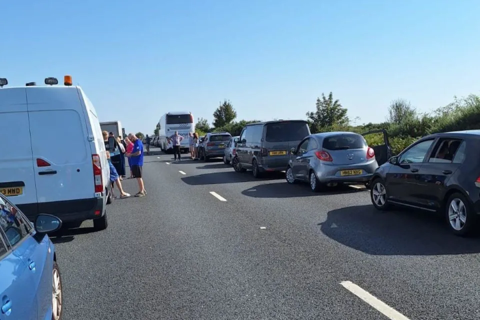 People out their vehicles on the A31 on September 9, 2023